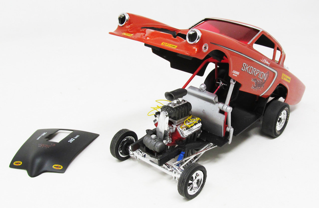 1/25 scale Studebaker Funny Car model kit in red with detailed engine components, designed by Atlantis for drag racing enthu